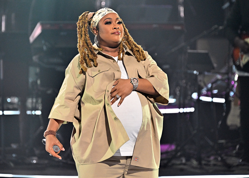 Da Brat performs on stage.