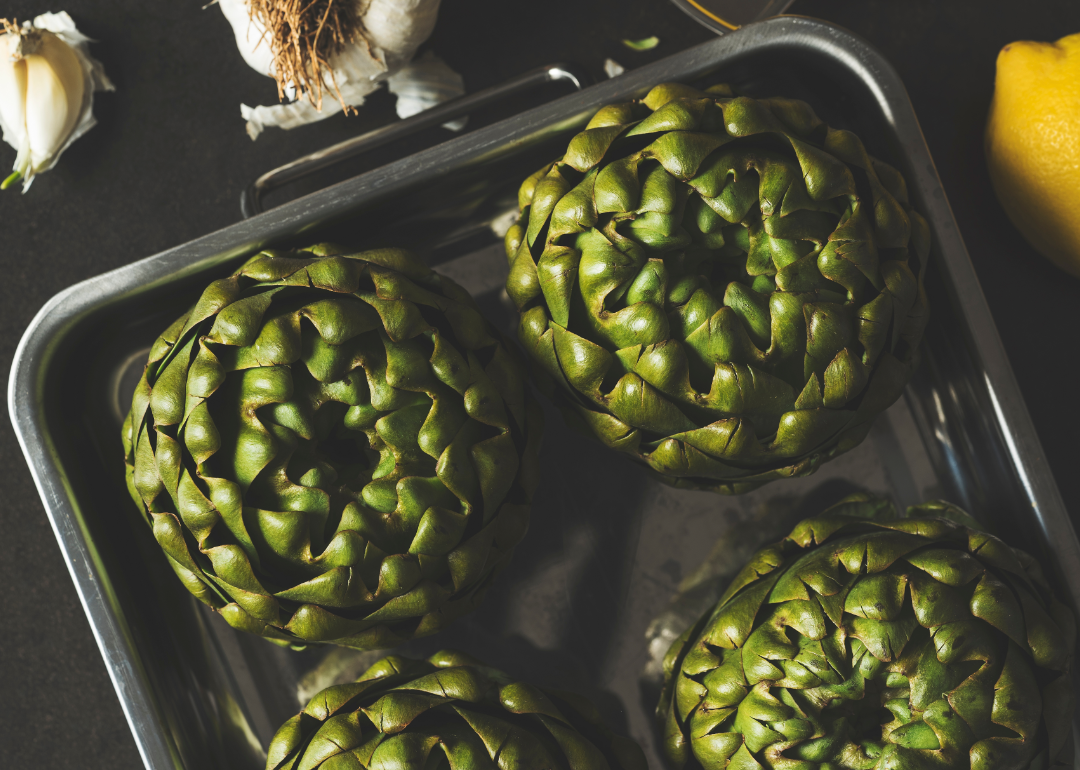 Artichokes in baking tray.