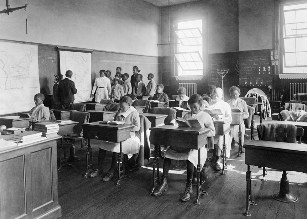 Students at their desks in a classroom.