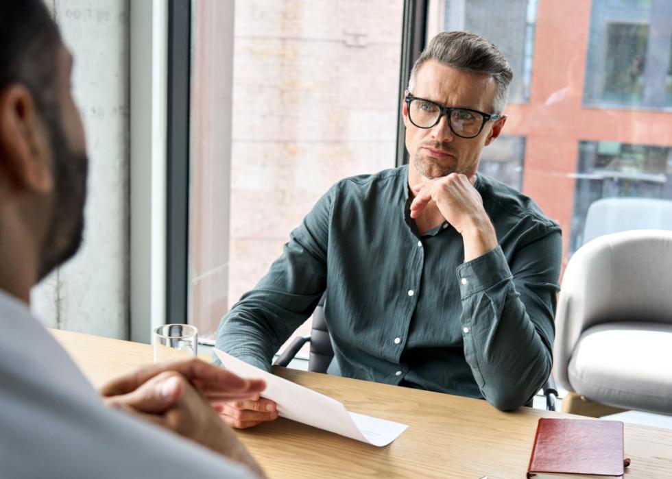 Professional in meeting with HR.