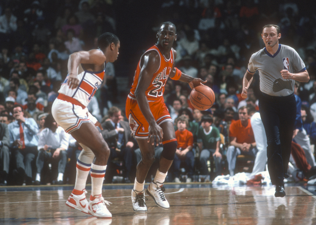 Michael Jordan dribbles the ball up court in a 1986 game.