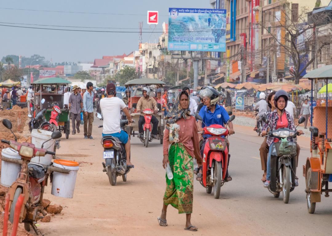 People on a busy street in Phnom Penh