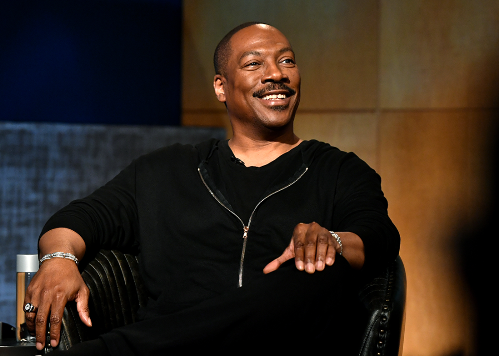 Eddie Murphy speaks onstage during event.