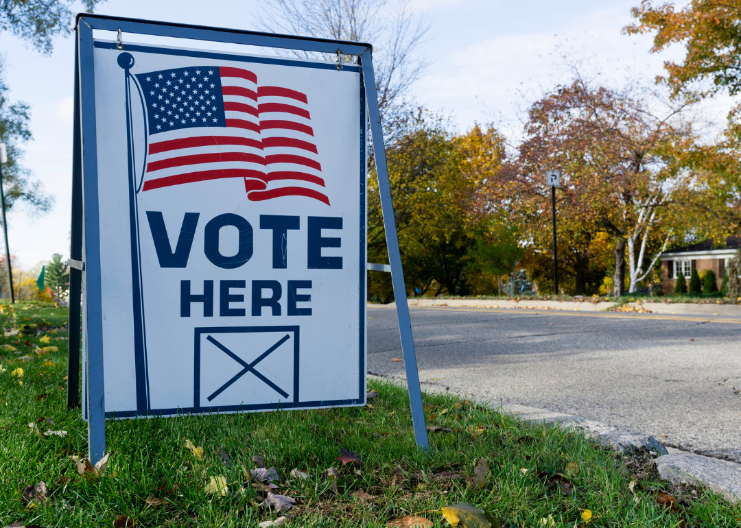 “Vote Here” polling place sign in neighborhood.