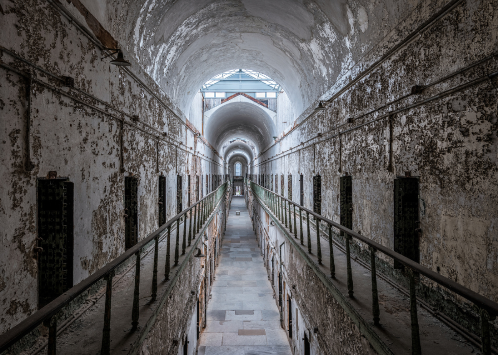Peeling paint walls in abandoned cell block in the Eastern State Penitentiary.