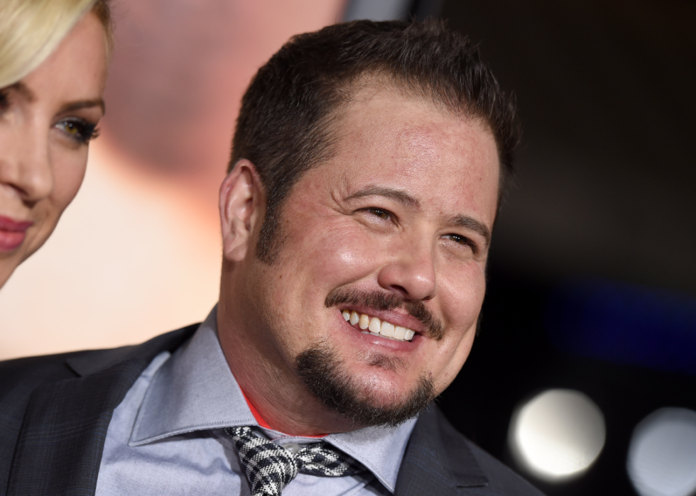 Chaz Bono smiles at event.