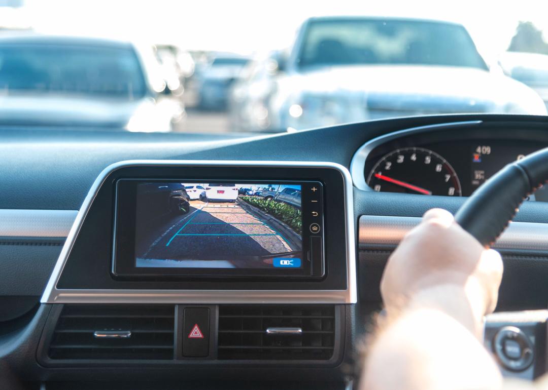 Person parking car with rearview monitor