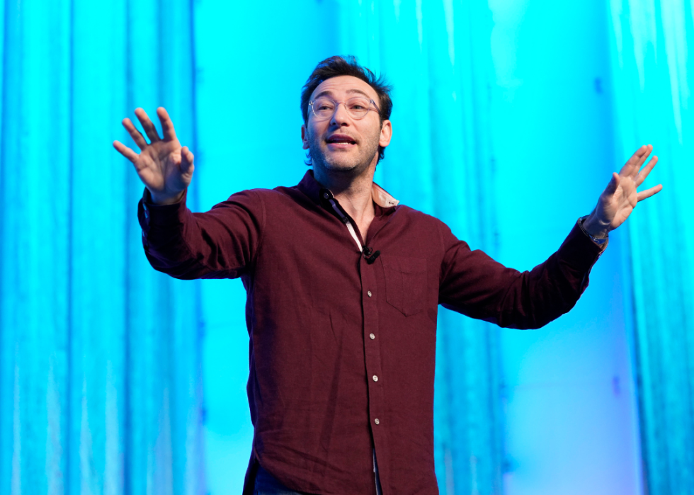 Simon Sinek speaks onstage