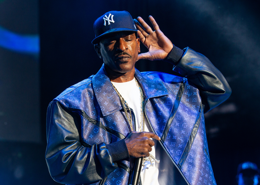 Rakim performs onstage.