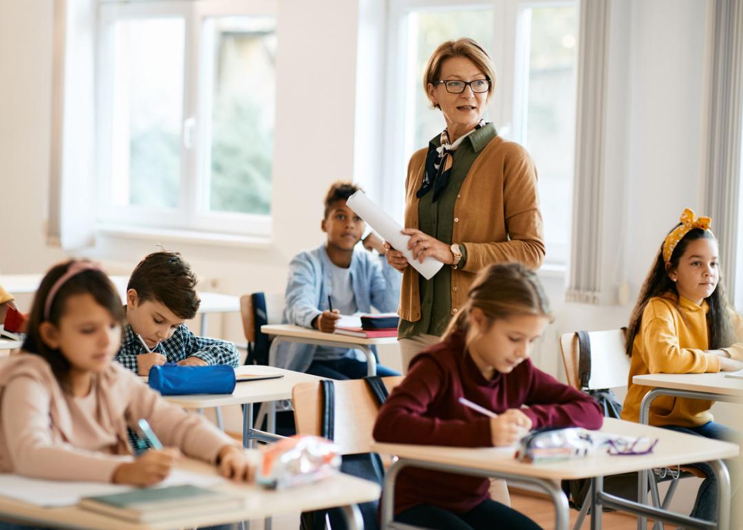 Teacher leading elementary school class.