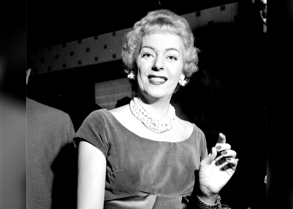 Christine Jorgensen smiles at event.