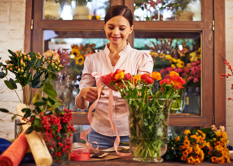 Floral designer making bouquets.