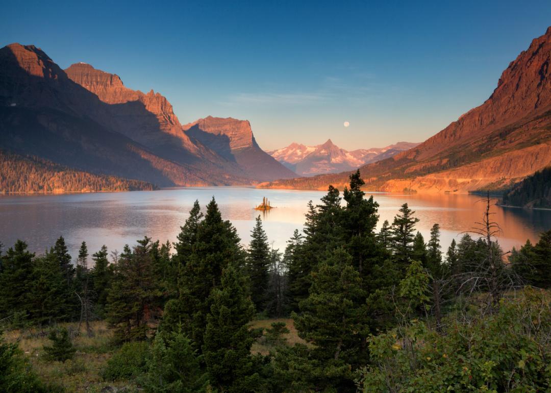 Sunrise over lake in Glacier National Park.