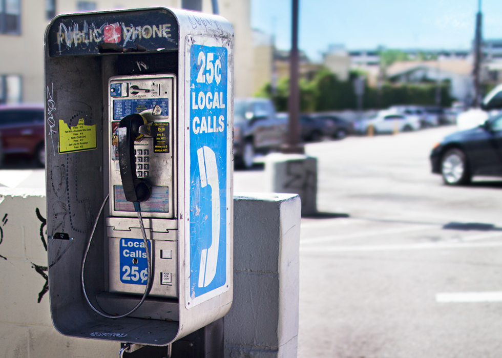 Payphone near parking lot.