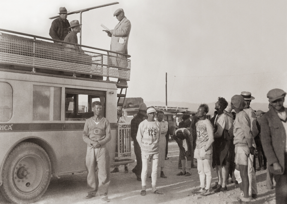 C.C. Pyle with runners participating in the cross country marathon race.