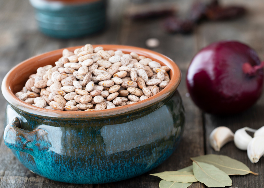 Bowl of pinto beans and spices.