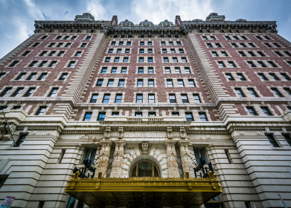 Low angled view of large historic hotel.
