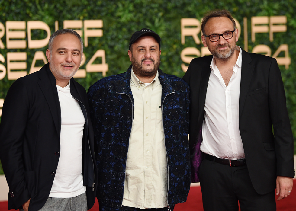 Mohamed Hefzy, Mahdi Fleifel and Geoff Arbourne attend the "To a Land Unknown" screening at the Red Sea International Film Festival.