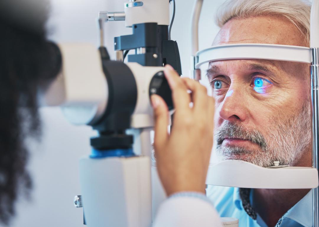 Ophthalmologist giving exam.