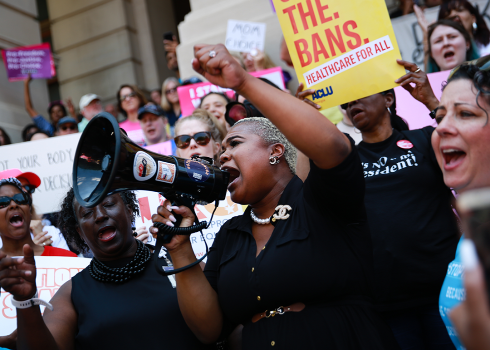 Georgia State Rep. Erica Thomas speaks during a protest.