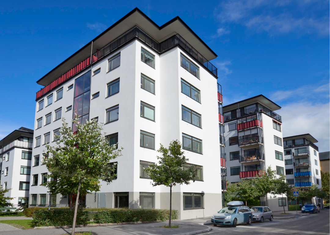 A new apartment building showing few signs of occupancy.