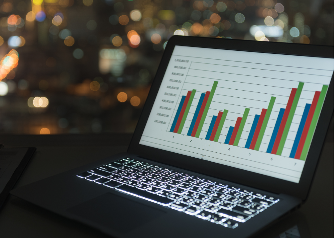 A laptop displaying an investment portfolio.
