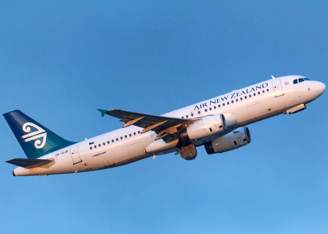 An Air New Zealand jet gaining altitude.