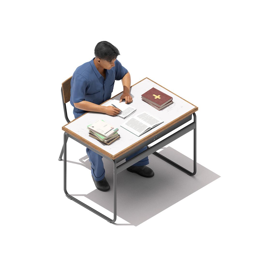 A man sits at a desk looking at an open book, with another book closed nearby with a cross on its cover. He is writing on a pad of paper.