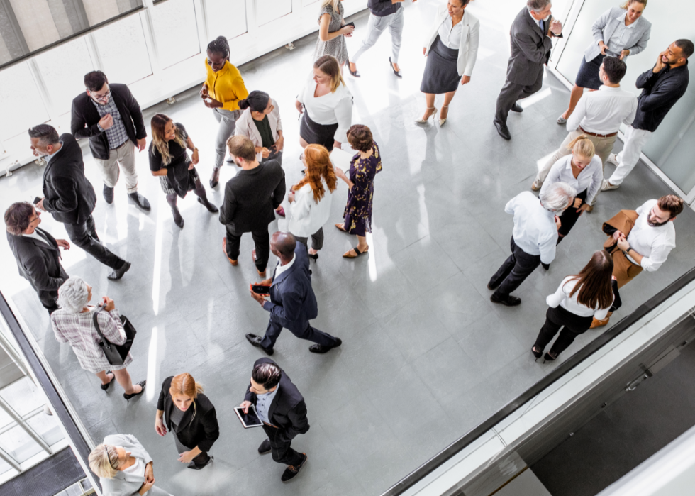 Overhead view of business people attending a networking event.