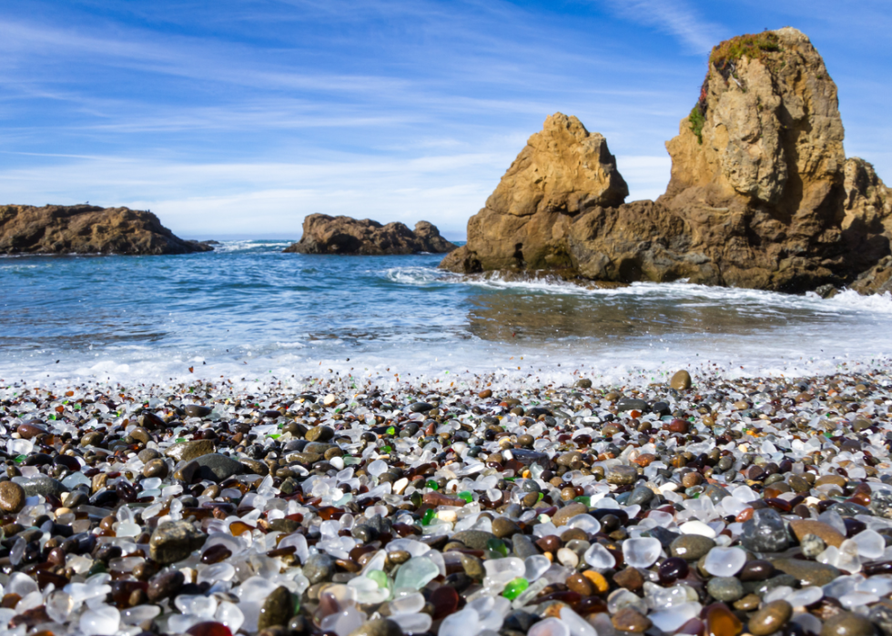 Colorful glass pebbles blanket this beach in Fort Bragg, the beach was used as a garbage dump years ago, nature has tumbled the glass and polished it making it a tourist destination