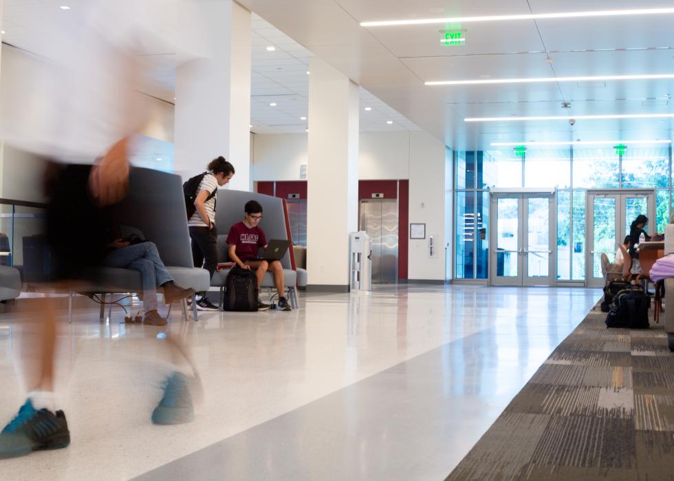 Eric Natividad talks to a classmate inside the student center at Mt. San Antonio College.