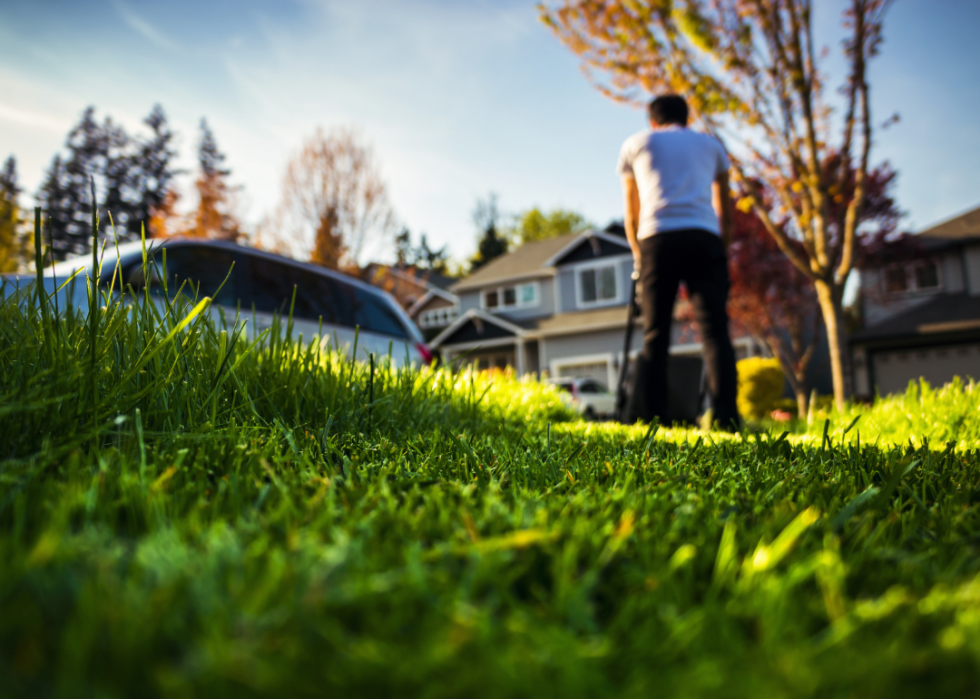 A man mowing his lawn