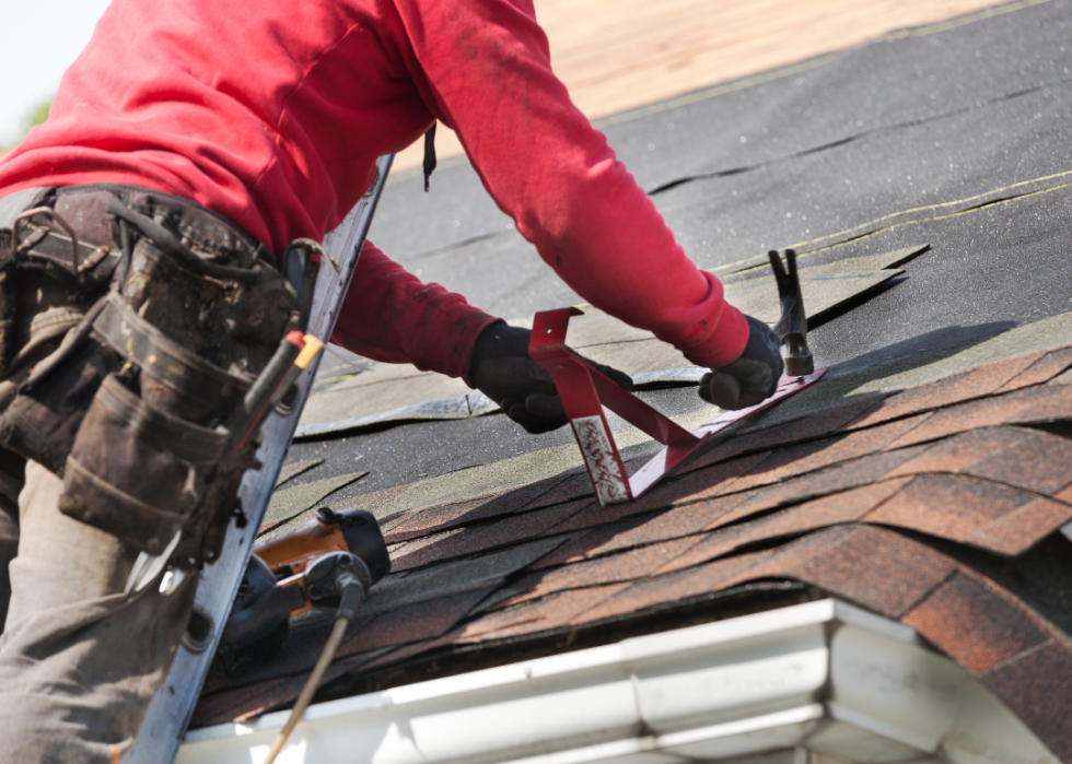 A man repairing a roof