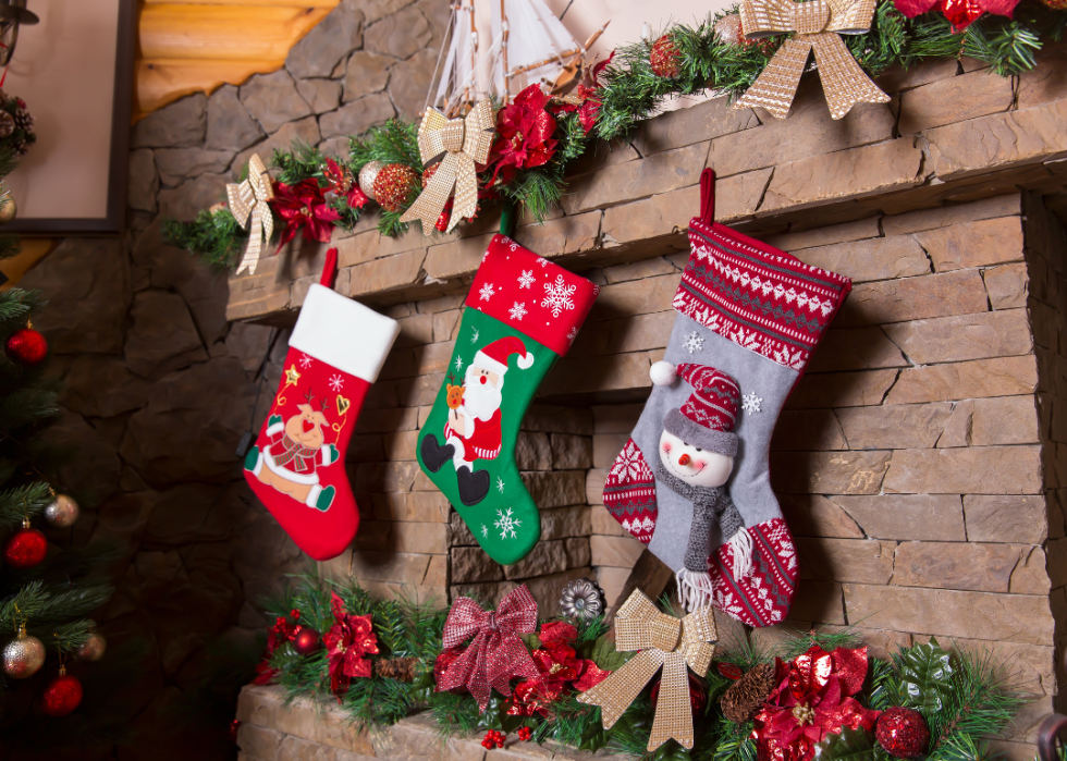Christmas stockings hanging over a fireplace