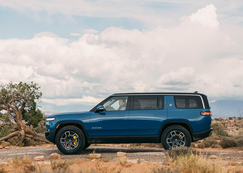 blue Rivian R1S in the desert