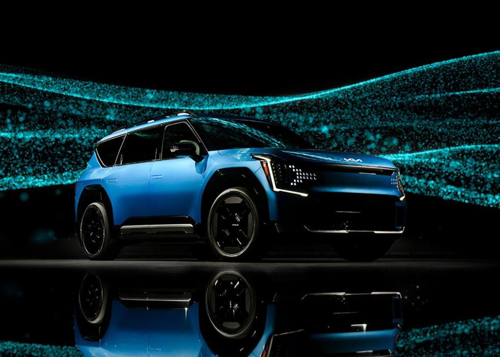 blue kia ev9 against sparkly background