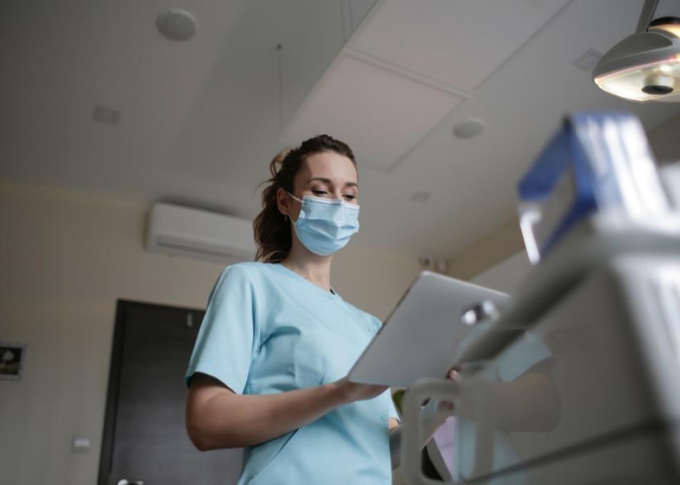 Nurse reviewing documents.