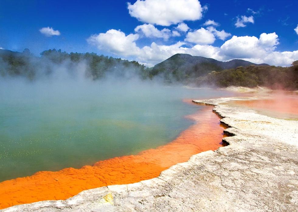 orange and green Champagne Pool in Wai-O-Tapu Geothermal Wonderland, Rotorua, New Zealand