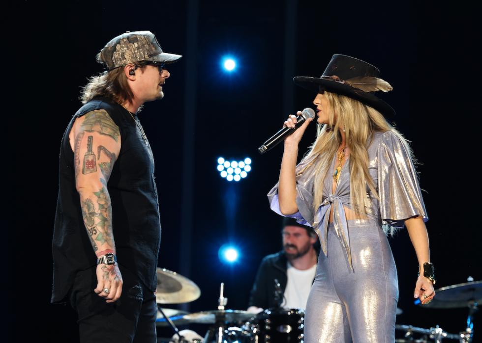 HARDY and Lainey Wilson perform on stage during CMA Fest 2023 at Nissan Stadium on June 9, 2023 in Nashville, Tennessee.