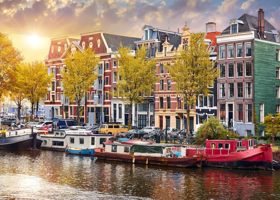 Panorama of famous dancing houses in Amsterdam, Netherlands.