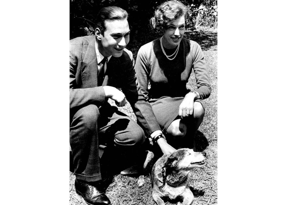 Prince William with Mrs. Phillip Parbury and the Parbury's dog "Dushka," an Australian Cattle Dog, in 1964.