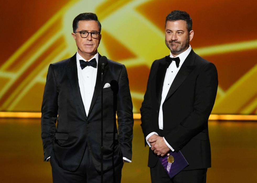 Stephen Colbert and Jimmy Kimmel speak onstage during the 71st Emmy Awards in Los Angeles on September 22, 2019.
