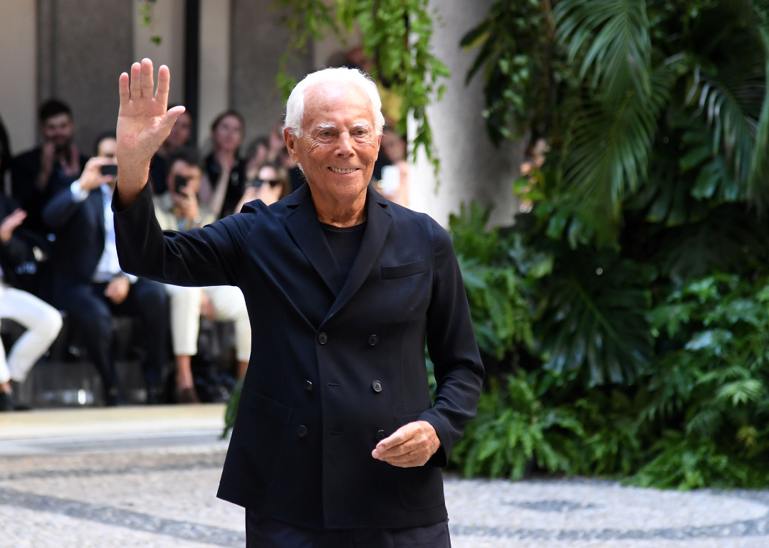 Giorgio Armani poses on the runway during Milan Men’s Fashion Week.