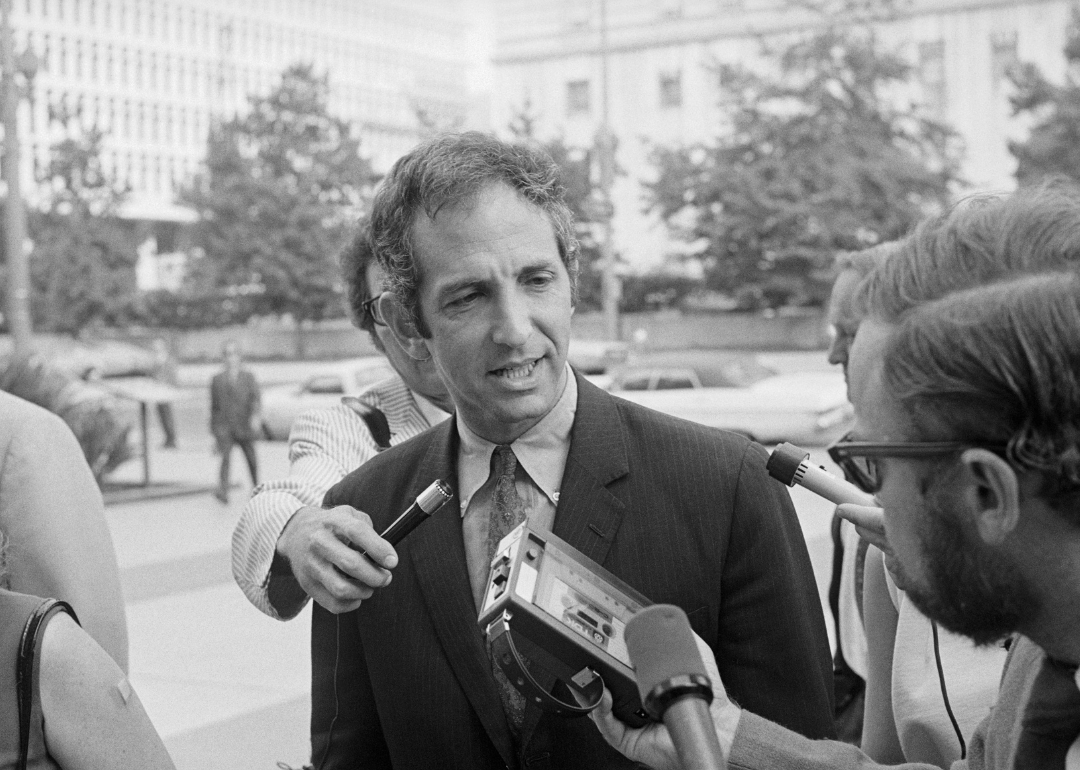 Daniel Ellsberg talks with newsmen as he arrives for arraignment.