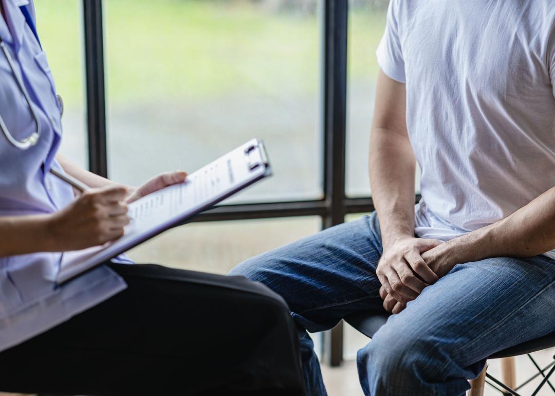 Doctor and patient discussing pain.