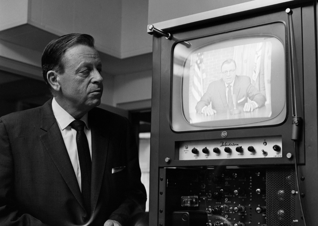 Gov. Jimmie H. Davis watching video taped speech.