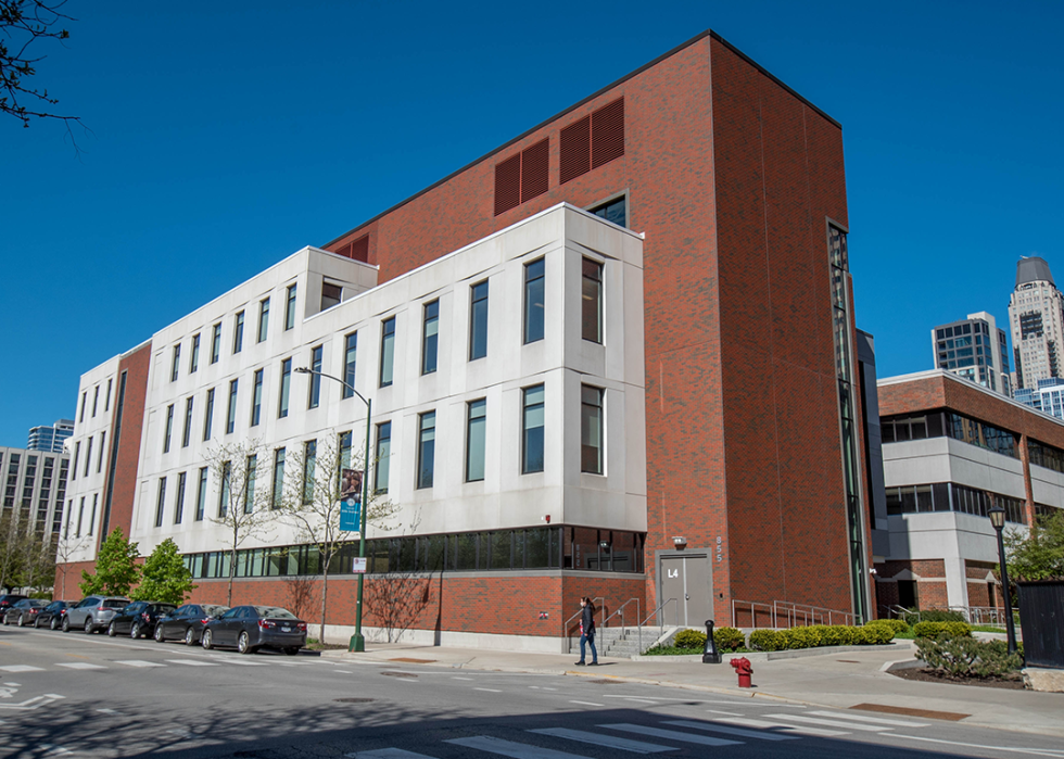 Chapman Center at Moody Bible Institute under a clear blue sky.