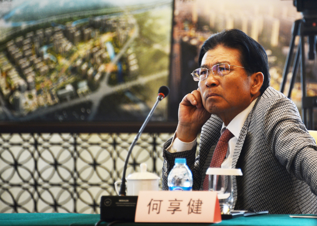 He Xiangjian attends a signing ceremony.