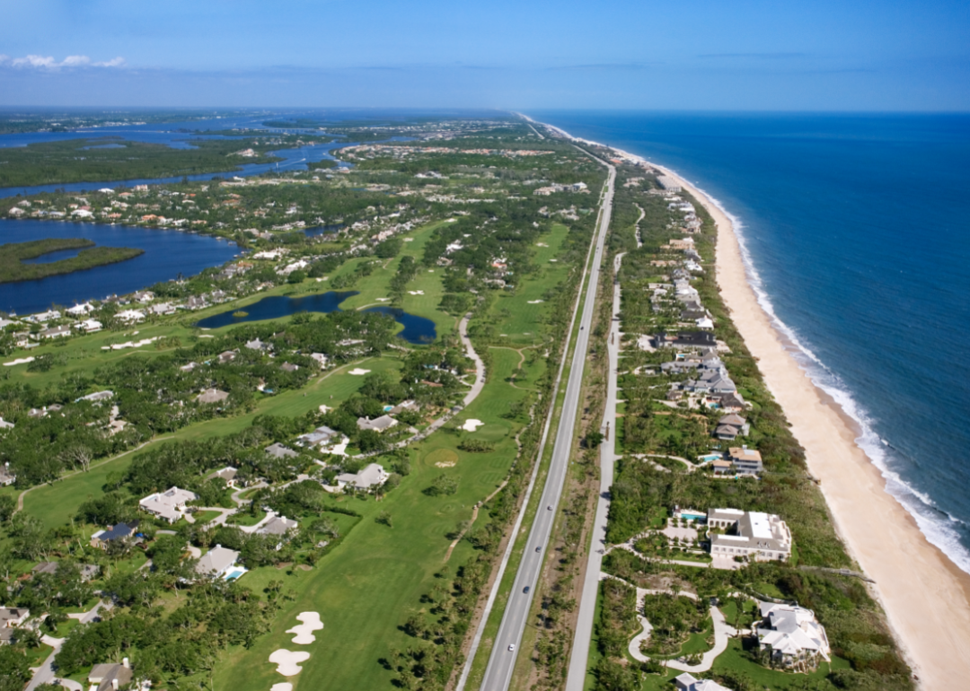 Aerial view of coast and inlet.