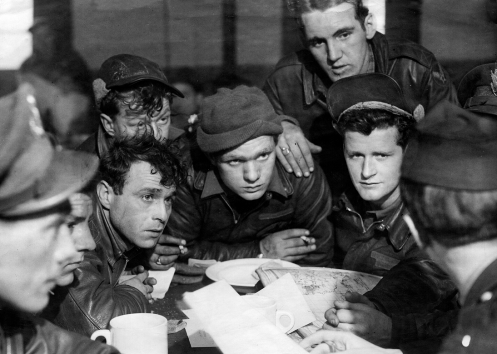Pilots of the American 8th Air Force receive instructions after an air raid in March 1944.